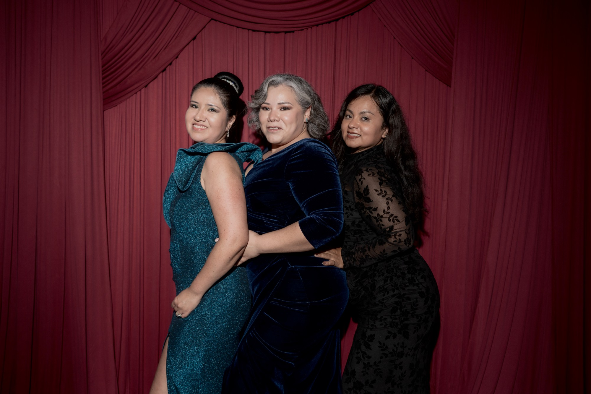 Members posed at the gala photo wall