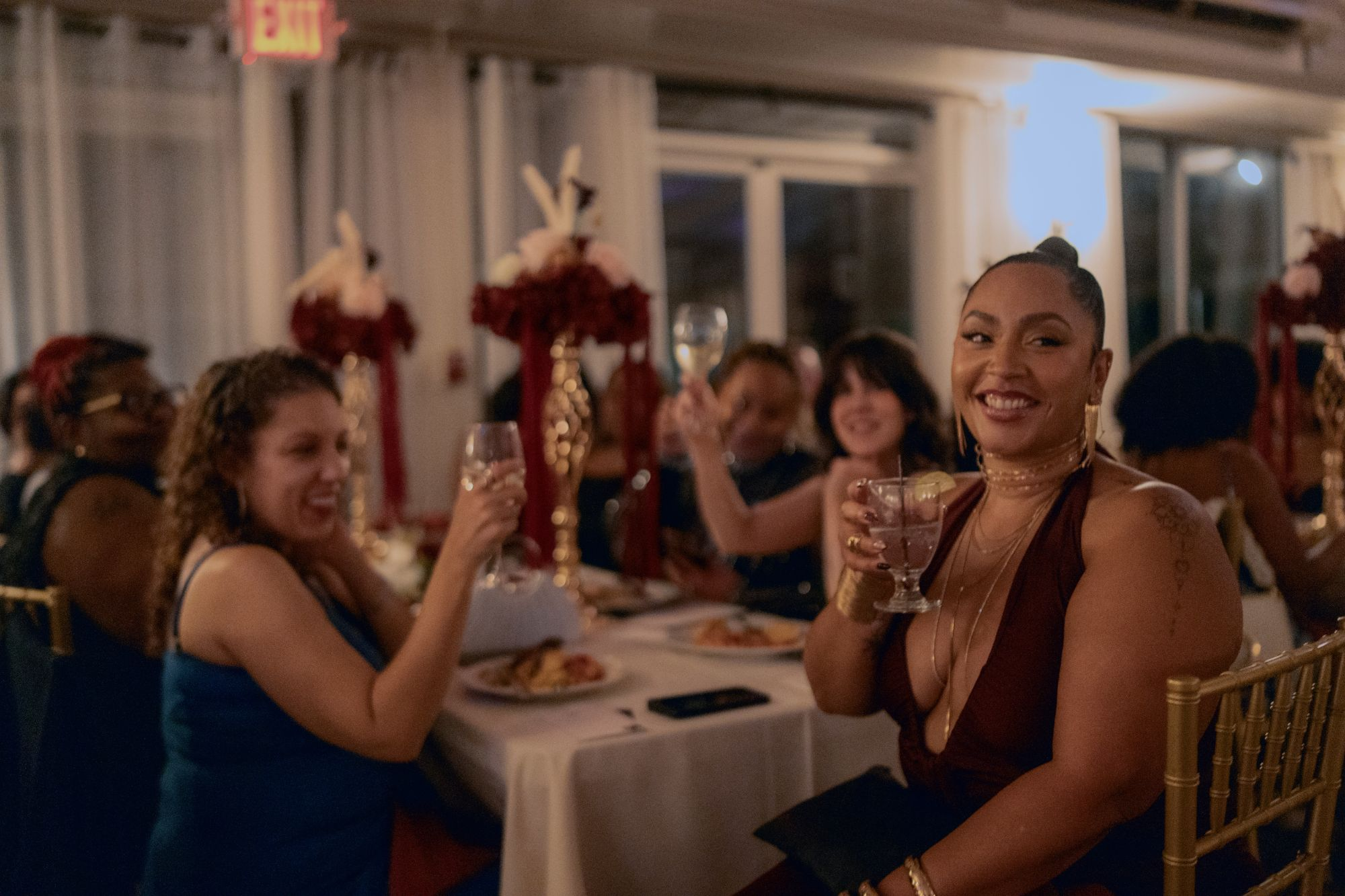 Club West members toasting at the gala dinner table