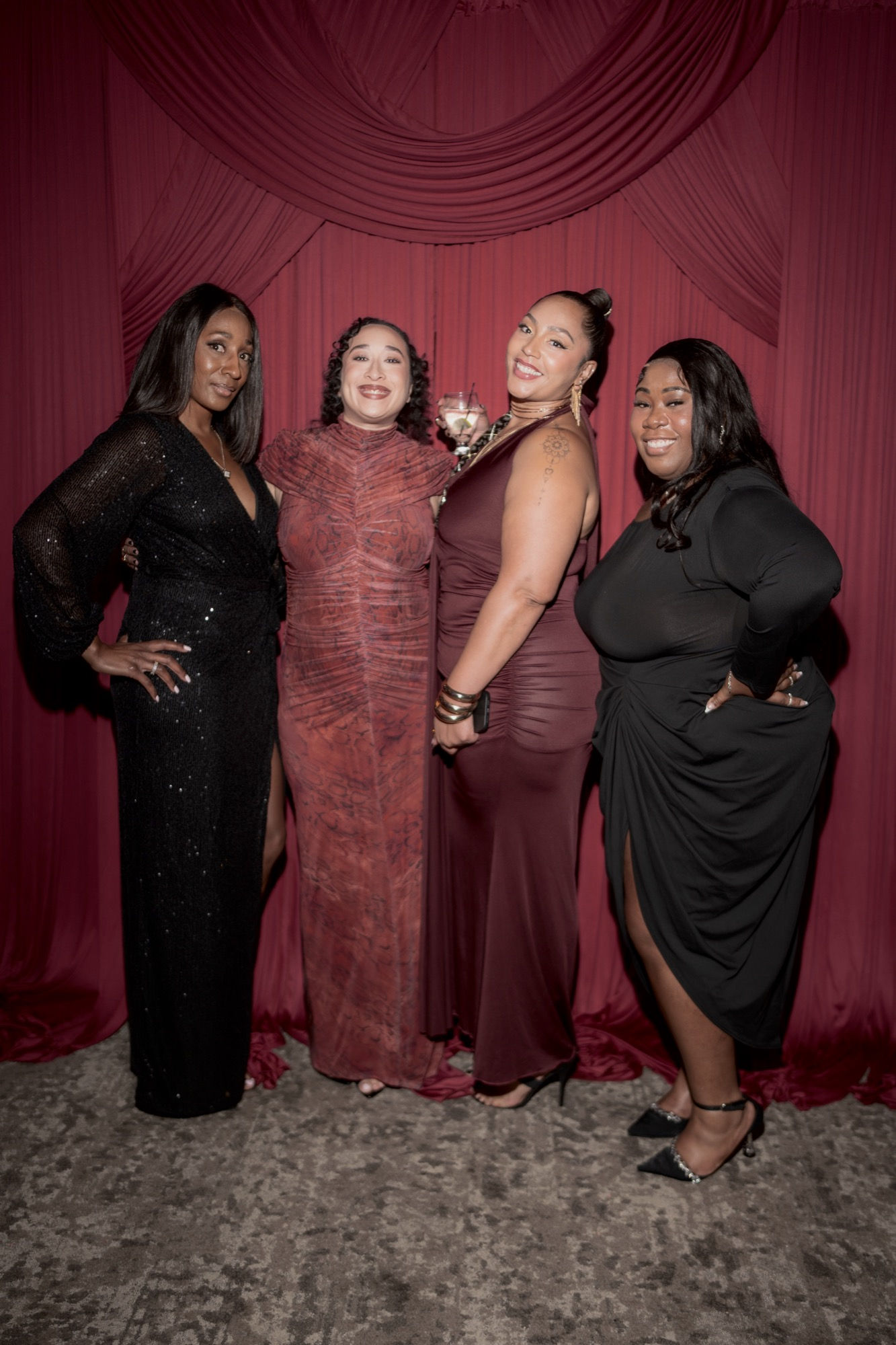 Members posed at the gala photo wall